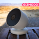A photo of the Nest security camera against a landscape backdrop